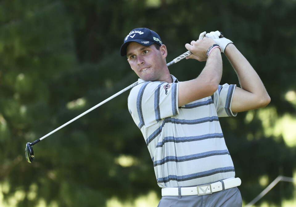 Puttet for en plass i The Open da en tilskuer ropte i baksvingen...
