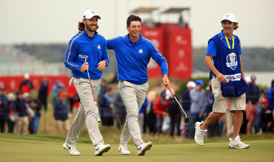 KOHLER, WISCONSIN - SEPTEMBER 24: Tommy Fleetwood of England and team Europe (L) and Viktor Hovland of Norway and team Europe reacts on the 15th green during Friday Afternoon Fourball Matches of the 43rd Ryder Cup at Whistling Straits on September 24, 2021 in Kohler, Wisconsin. (Photo by Mike Ehrmann/Getty Images)