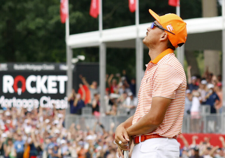 DETROIT, MI - JULY 02:  PGA golfer Rickie Fowler and his caddy Ricky Romano react after Fowler makes the winning birdie putt on the 18th hole during a playoff on July 2, 2023, during the final round to win the Rocket Mortgage Classic at the Detroit Golf Club in Detroit, Michigan. (Photo by Brian Spurlock/Icon Sportswire via Getty Images)